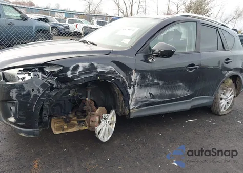 2014 Mazda Cx-5 Touring z USA, uszkodzony, nr VIN JM3KE4CY5E0353335